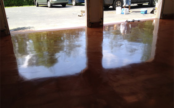 This image shows a garage with an epoxy floor.