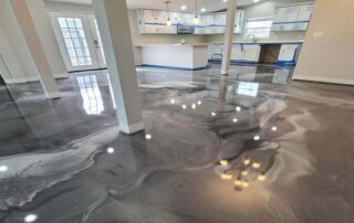 This image shows a floor with metallic epoxy design.
